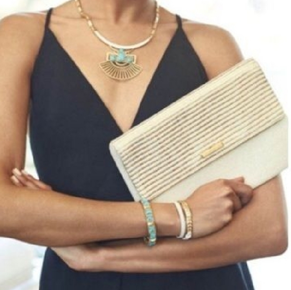 S&D city slim gold stripe clutch